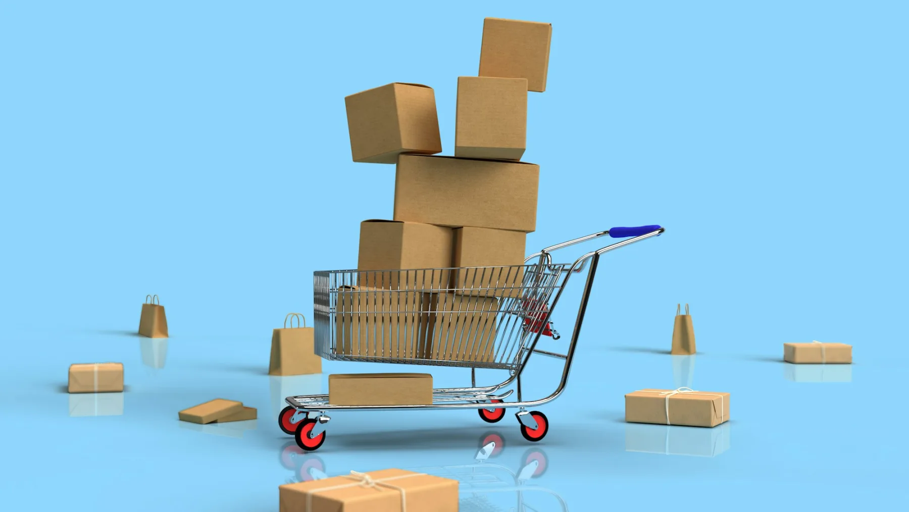 Miniature shopping cart on a laptop keyboard — ecommerce concept.